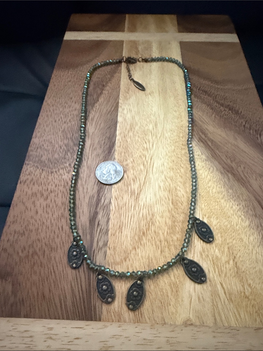 Plunder Iridescent Green Beaded Necklace with Antique Brass Drop Charms